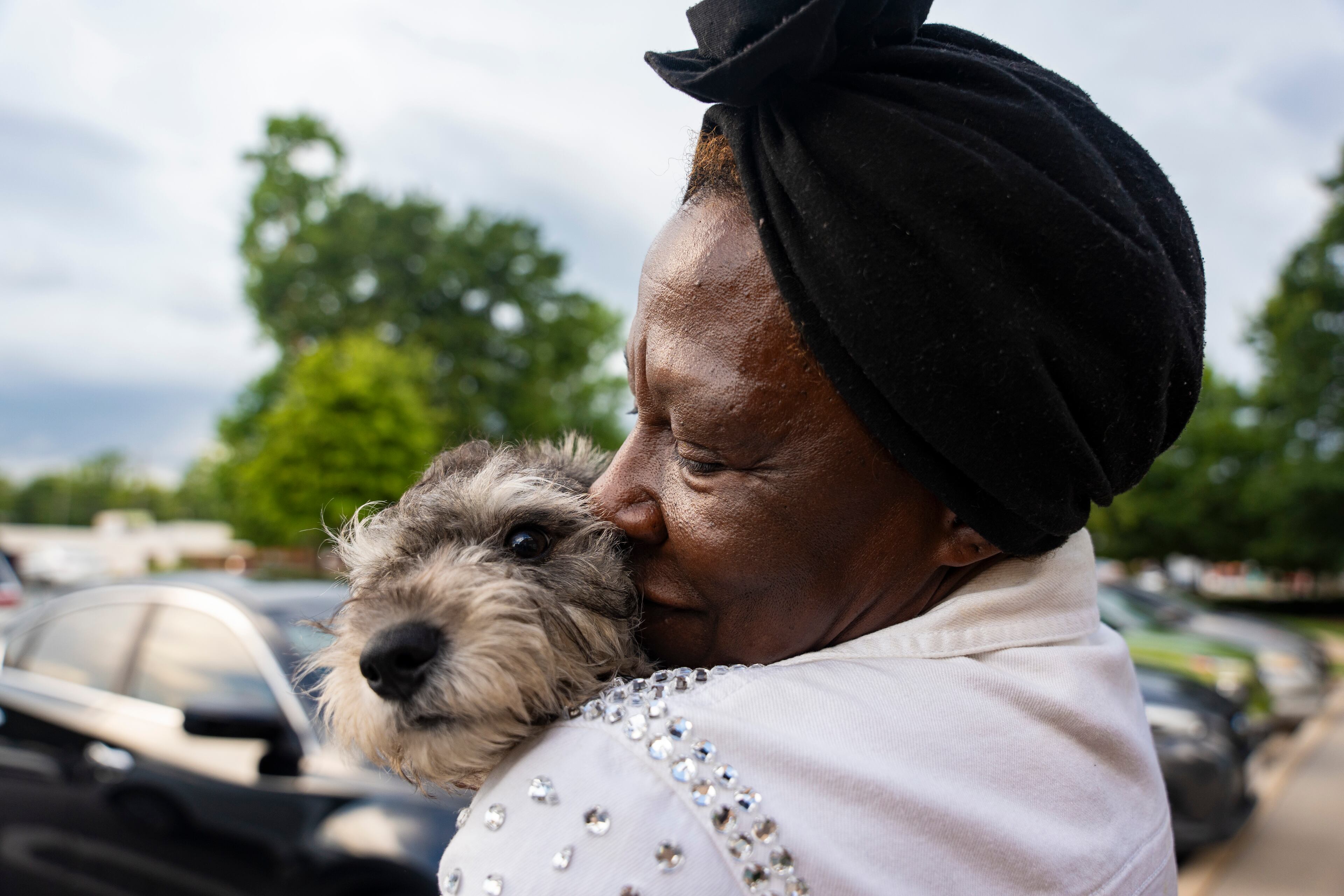 Mary Ann Dunkentell is reunited with her dog, Va-Beep, at the DeKalb Animal Shelter on Tuesday, July 1, 2025, in Chamblee. (Olivia Bowdoin for the AJC)