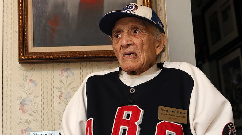 Starting in 1939, James "Red" Moore had several stints with the Atlanta Black Crackers and the Baltimore Elite Giants.