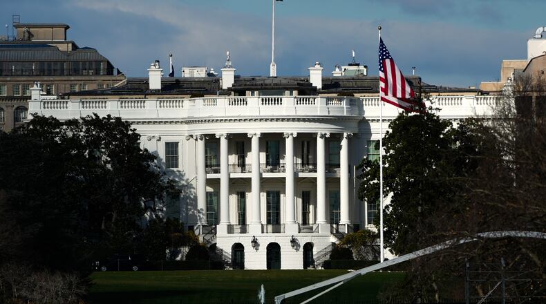 The White House is seen from the National Mall, Friday, Nov. 28, 2025, in Washington. (AP Photo/Julia Demaree Nikhinson)