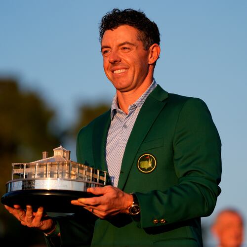 Rory McIlroy, of Northern Ireland, holds the trophy after winning the Masters golf tournament at the Augusta National Golf Club, Sunday, April 12, 2026, in Augusta, Ga.(AP Photo/Ashley Landis)
