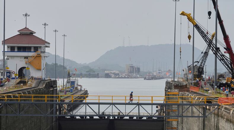 FILE - Workers carry out maintenance at the Pedro Miguel locks of the Panama Canal during routine upkeep in Panama City, Friday, May 30, 2025. (AP Photo/Matias Delacroix, File)