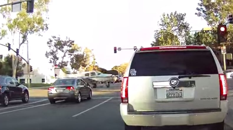 Plane lands on street