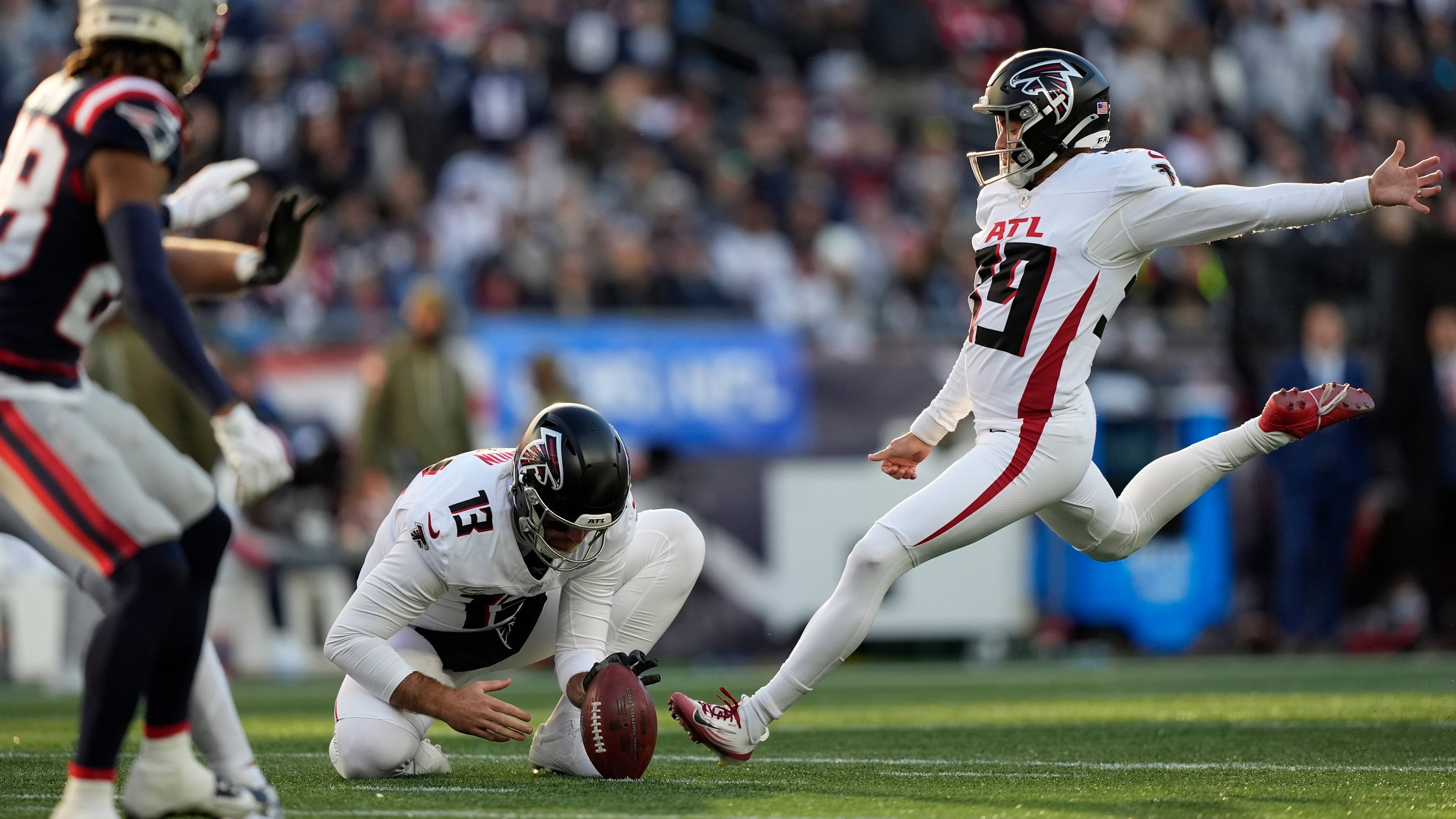 Atlanta Falcons place kicker Parker Romo (39) kicks a field goad against the New England Patriots during the second half of an NFL football game, Sunday, Nov. 2, 2025, in Foxborough, Mass. (AP Photo/Robert F. Bukaty)