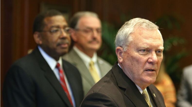 Gov. Nathan Deal introduces new members of the DeKalb County school board Wednesday.
