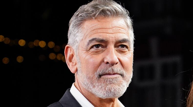 FILE - George Clooney appears at the screening of the film "The Boys In The Boat" in London on Dec. 3, 2023. (Photo by Alberto Pezzali/Invision/AP, File)