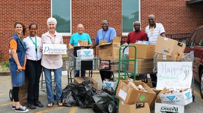 Students at Rock Springs Elementary School recently donated more than 1,300 food items to the Lawrenceville Co-op, in honor of Principal Penny Clavijo's 50th birthday. (Credit: Gwinnett County Public Schools)