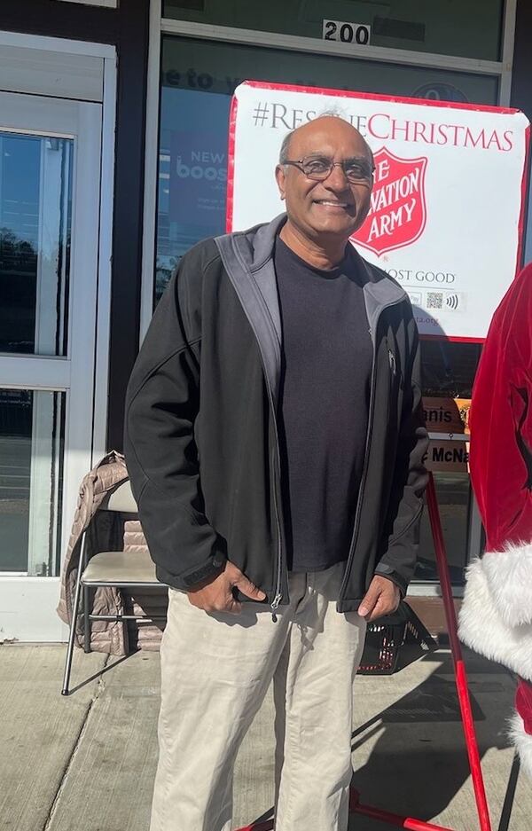 Mahendra Patel as he rang the bell with the Salvation Army. (Courtesy of Patel family)