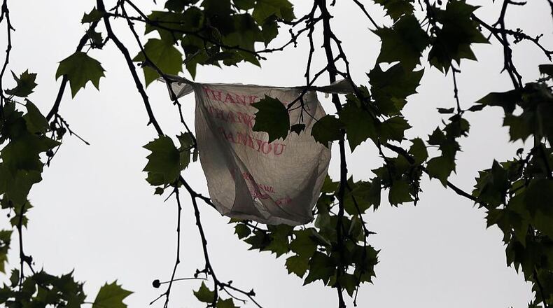 NEW YORK, NY - MAY 05: A plastic bag sits stuck in a tree in a Manhattan street on May 05, 2016 in New York City.
New York's City Council is scheduled to vote Thursday on a bill that would require most stores to charge five cents per bag in an effort to cut down on plastic waste. New York's sanitation department estimates that every year 10 billion bags are thrown in the trash. (Photo by Spencer Platt/Getty Images)
