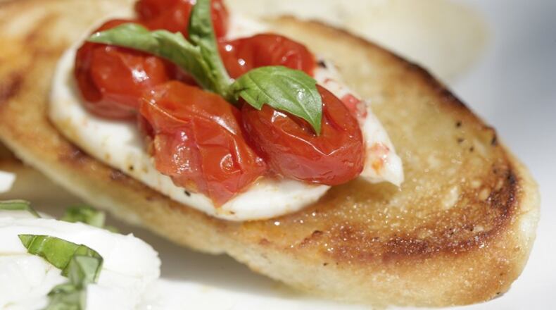 Caprese Crostini with Grilled Tomatoes. (Patricia Beck/Detroit Free Press/TNS)