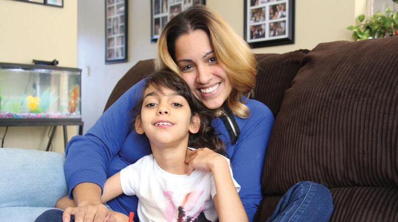 Lorna Rodriguez and her daughter Natalia moved recently from Puerto Rico to Johns Creek. Photo: Johanes Rosell /MundoHispanico