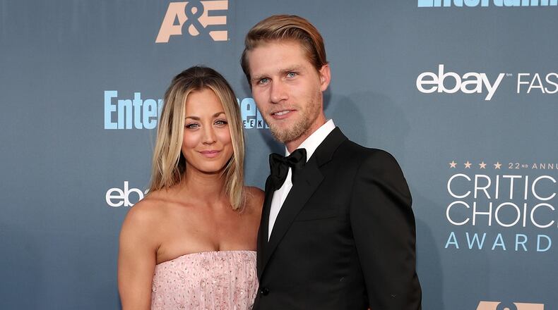 Actress Kaley Cuoco (L) became engaged to boyfriend Karl Cook on her 32nd birthday.