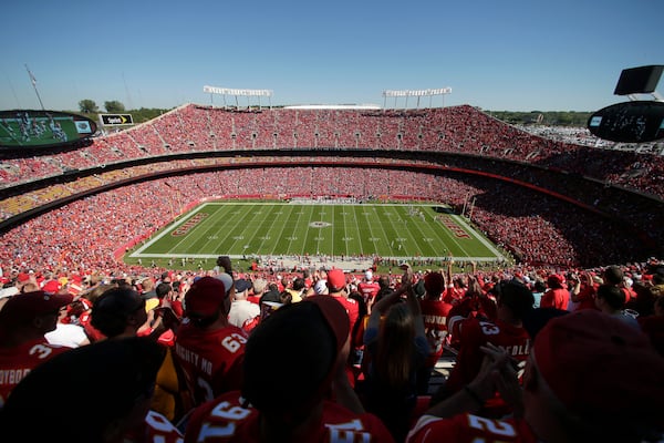 FILE - Fans watch an NFL football game between the Kansas City Chiefs and the New York Giants at Arrowhead Stadium, Sept. 29, 2013, in Kansas City, Mo. (AP Photo/Charlie Riedel, file)
