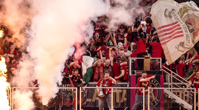 Atlanta United's supporters celebrate during Sunday's game against NYCFC at Mercedes-Benz Stadium.