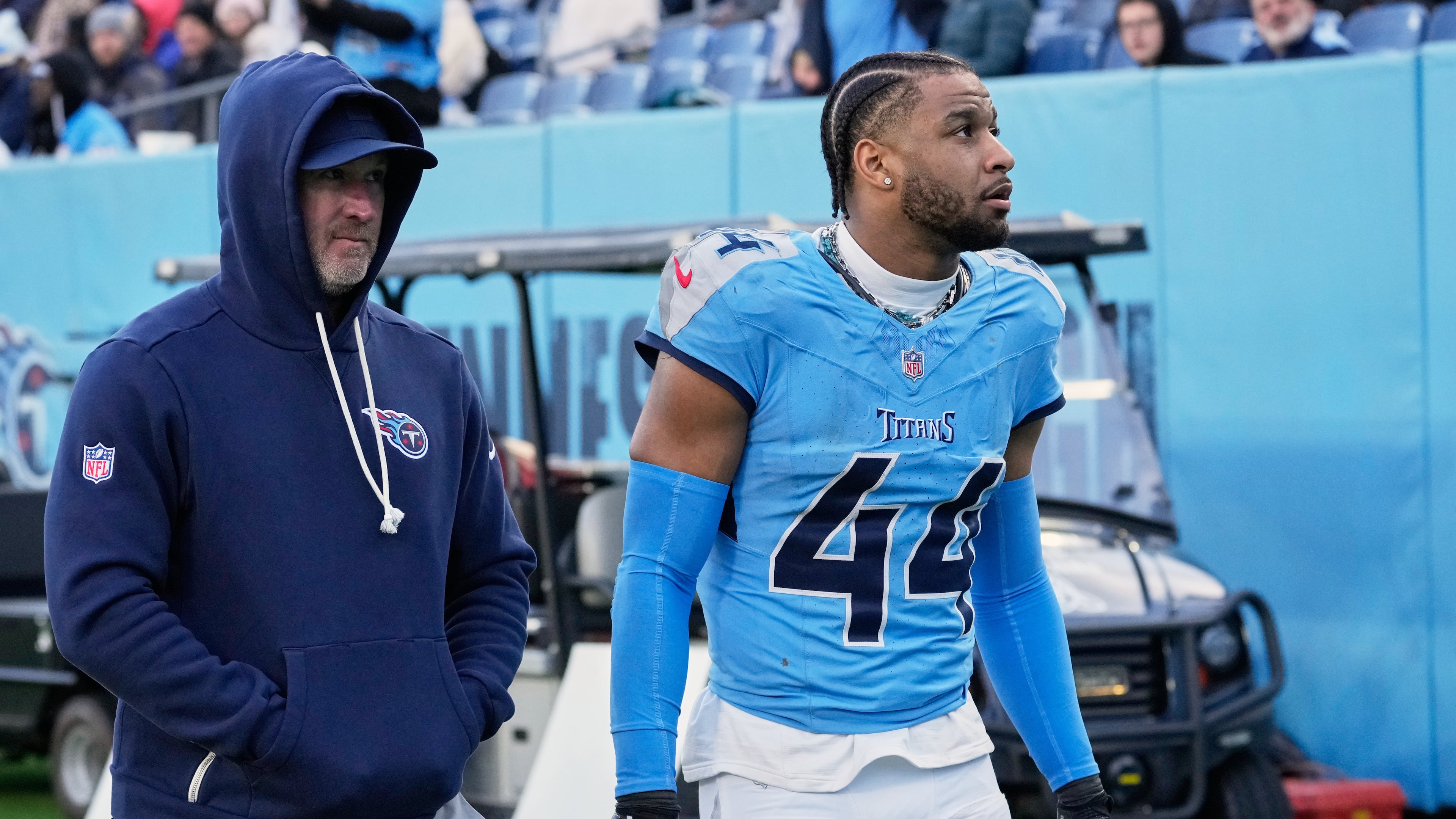 Tennessee Titans safety Mike Brown (44) leaves the field after he was ejected from an NFL football game between the Tennessee Titans and the Jacksonville Jaguars Sunday, Nov. 30, 2025, in Nashville, Tenn. (AP Photo/George Walker IV)