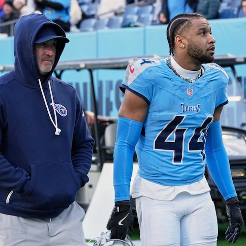 Tennessee Titans safety Mike Brown (44) leaves the field after he was ejected from an NFL football game between the Tennessee Titans and the Jacksonville Jaguars Sunday, Nov. 30, 2025, in Nashville, Tenn. (AP Photo/George Walker IV)