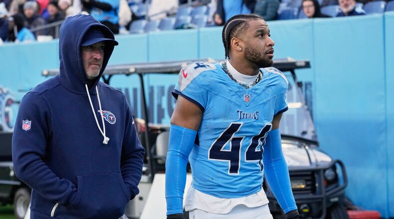 Tennessee Titans safety Mike Brown (44) leaves the field after he was ejected from an NFL football game between the Tennessee Titans and the Jacksonville Jaguars Sunday, Nov. 30, 2025, in Nashville, Tenn. (AP Photo/George Walker IV)