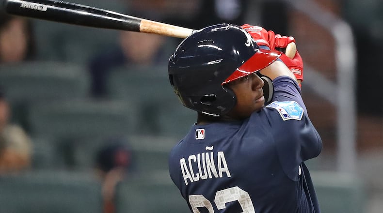 Ronald Acuna hits a single during the third inning in the Future Stars Exhibition Game on Tuesday, March 27, 2018, at SunTrust Park in Atlanta.  Curtis Compton/ccompton@ajc.com
