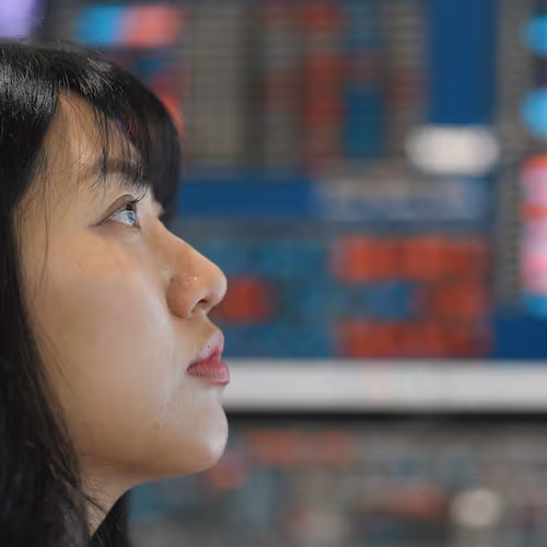 A dealer watches computer monitors at a dealing room of Hana Bank in Seoul, South Korea, Friday, May 15, 2026. (AP Photo/Lee Jin-man)