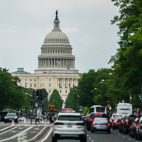 The U.S. Capitol is seen as cars drive on Pennsylvania Avenue, during rush hour, Wednesday, May 13, 2026, in Washington. (AP Photo/Julia Demaree Nikhinson)