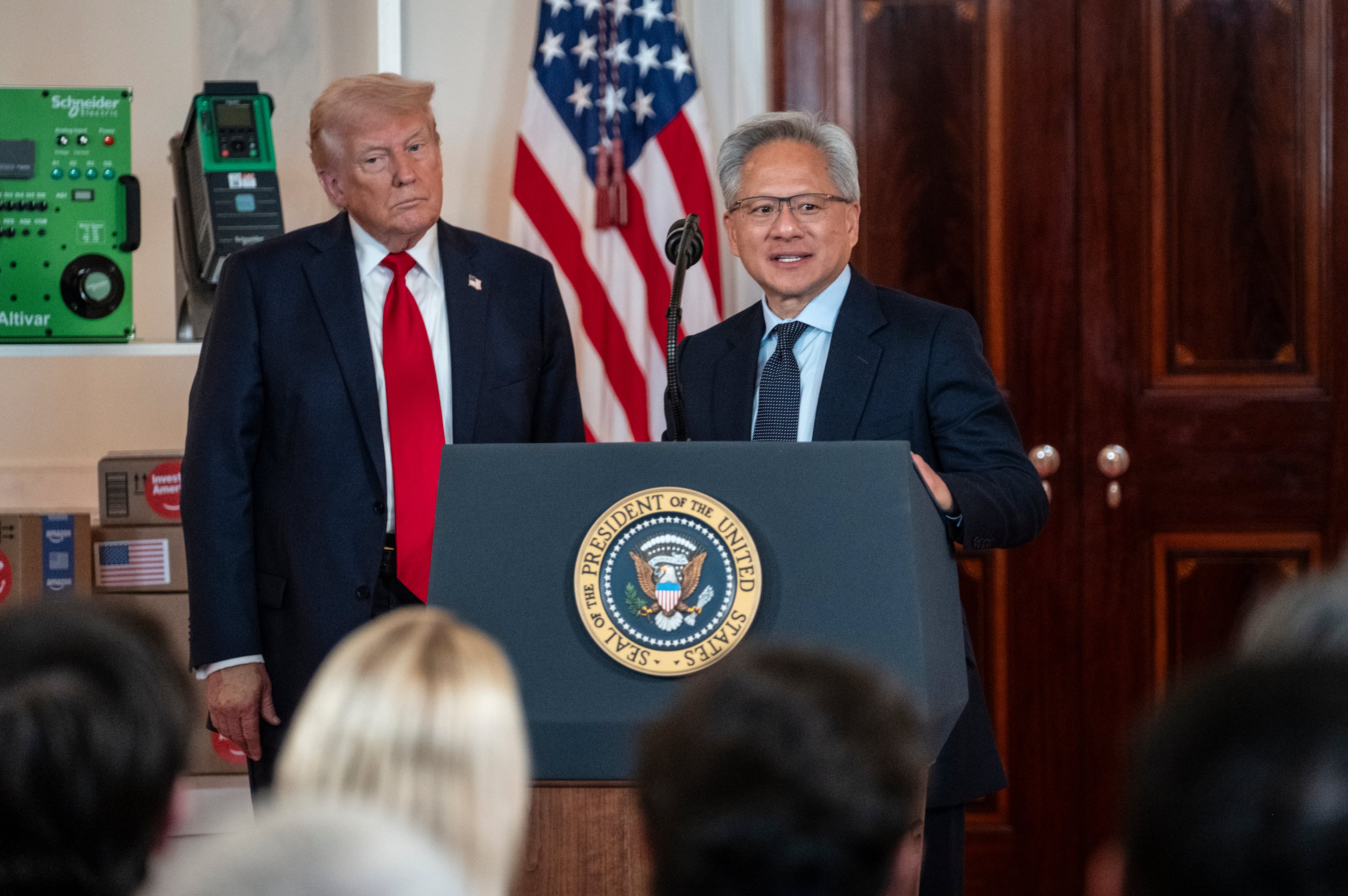 Jensen Huang, the chief executive of Nvidia, which controls more than 90 percent of the market for chips needed to build artificial intelligence systems, with President Donald Trump in Washington, April 30, 2025.  (Pete Marovich/The New York Times)