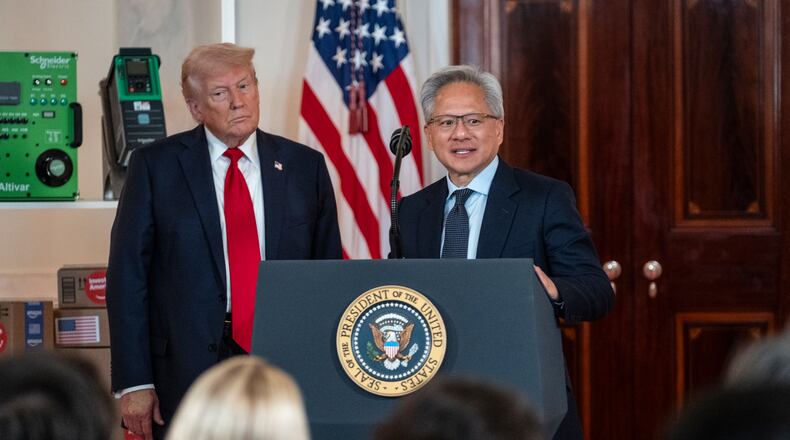 Jensen Huang, the chief executive of Nvidia, which currently controls more than 90% of the market for chips needed to build artificial intelligence systems, with President Donald Trump in Washington, April 30, 2025. (Pete Marovich/The New York Times)