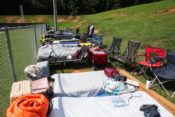 Air mattresses were lined up near the field Friday where players will sleep as they endeavor to play kickball for 52 straight hours. (Abbey Cutrer / AJC)
