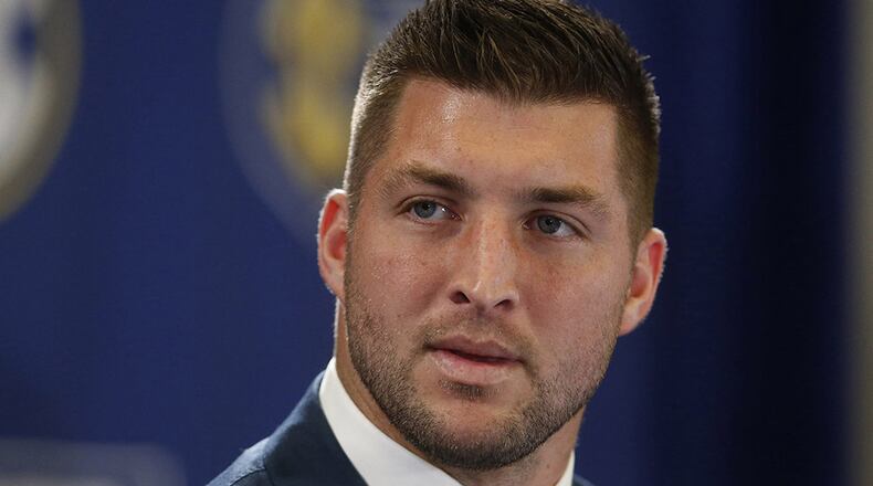 Former Florida Gators QB Tim Tebow is currently an analyst for the SEC Network. AP file photo