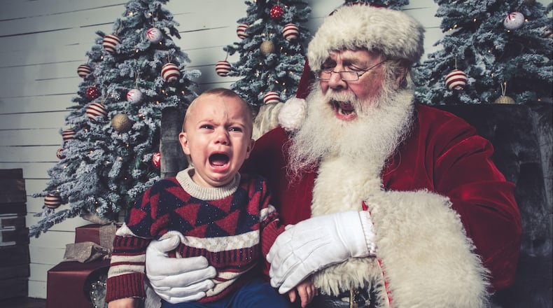 Henry Stewart is not happy about his visit with Santa. So it goes for many of the children attending photo sessions at Jeff Roffman’s studio. Roffman has become famous for his Christmas-with-Santa photos, which often feature crying children. Is this wrong? The grown-ups say no. No one asked the children. CONTRIBUTED BY JEFF ROFFMAN / THE STEWART FAMILY