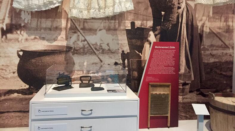 An Atlanta History Center exhibit on the Laundry Workers’ Strike of 1881, during which more than 3,000 Black laundry workers stopped work for weeks, demanding fair wages. Kelundra Smith's new play, "The Wash," is based on the event. Courtesy of Atlanta History Center
