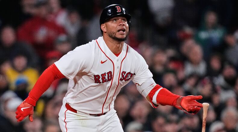 Boston Red Sox's Willson Contreras watches the flight of his RBI double during the fourth inning of a baseball game against the Milwaukee Brewers at Fenway Park, Monday, April 6, 2026, in Boston. (AP Photo/Charles Krupa)