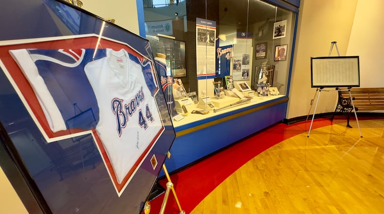 An exhibit marking the 50th anniversary of Hank Aaron's record-breaking 715th home run is on display through July at the Georgia Sports Hall of Fame in Macon. (Joe Kovac Jr. / AJC)