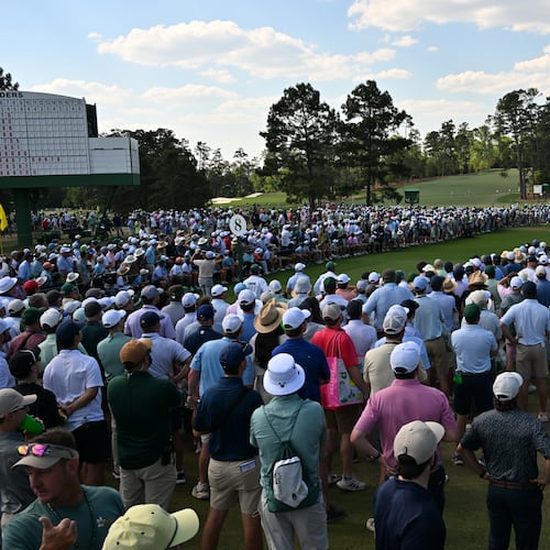 Patrons watch Cameron Young tee off on eighth hole during final round of the Masters, at Augusta National Golf Club, Sunday, April 12, 2026, in Augusta. (Hyosub Shin/AJC)