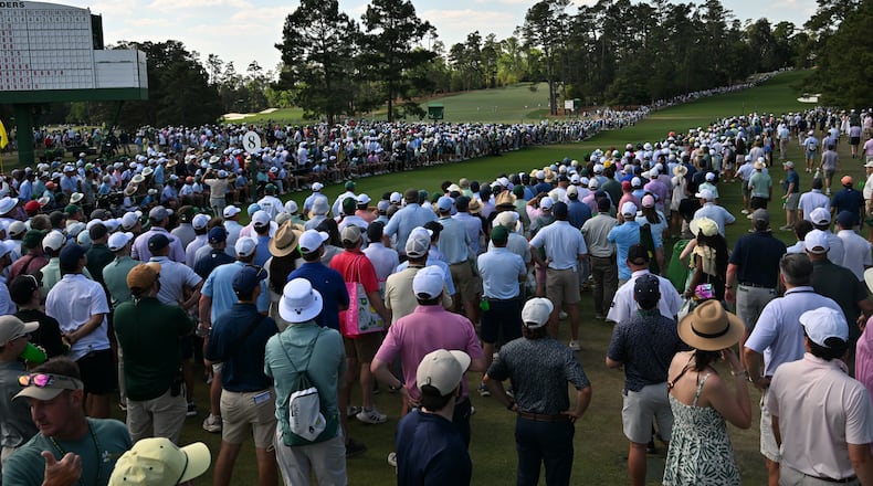 Patrons watch Cameron Young tee off on eighth hole during final round of the Masters, at Augusta National Golf Club, Sunday, April 12, 2026, in Augusta. (Hyosub Shin/AJC)