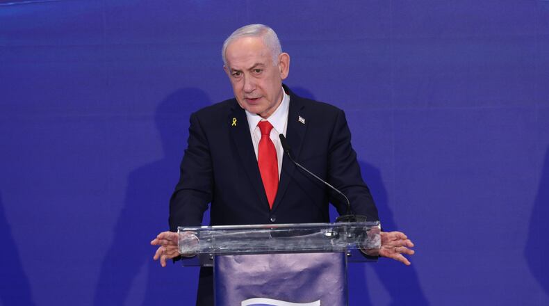 Israeli Prime Minister Benjamin Netanyahu speaks during a joint press conference after a trilateral meeting with Cyprus President Nikos Christodoulides and Greek Prime Minister Kyriakos Mitsotakis at the Citadel of David Hotel in Jerusalem, Monday Dec. 22, 2025. (Abir Sultan/Pool Photo via AP)