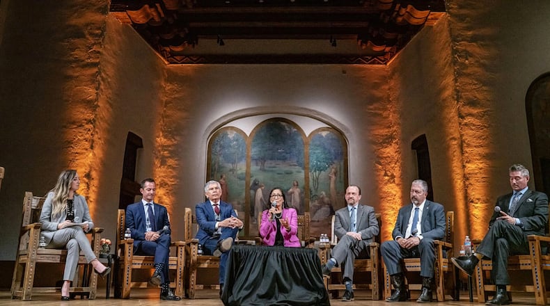 Gubernatorial candidates, from second left, Doug Turner, Duke Rodriguez, Deb Haaland, Gregg Hull and Sam Bregman answer questions from moderators Rikki-Lee Chavez, left, and Matthew Jaramillo, right, during a forum, April 22, 2026, in Santa Fe, N.M. (Gabriela Campos/Santa Fe New Mexican via AP)