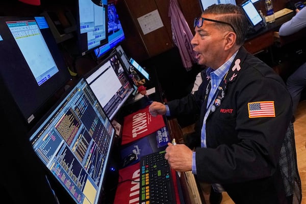 Trader Jonathan Mueller works on the floor of the New York Stock Exchange, Wednesday, April 23, 2025. (AP Photo/Richard Drew)