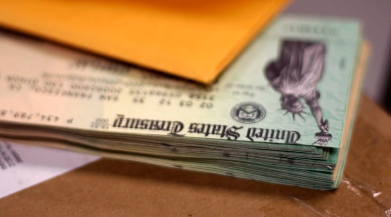 Members carried out both frauds by creating fake driver’s licenses and falsified documents to cash tax refund and Social Security checks and obtain store credit cards, respectively, prosecutors said.