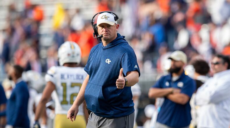 Georgia Tech head coach Brent key gives a thumbs up during the second half of an NCAA college football game against Virginia Saturday, Nov. 4, 2023, in Charlottesville, Va. (AP Photo/Mike Caudill)
