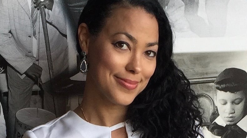 Karcheik Sims-Alvarado, an historian and author, curated the Atlanta BeltLine photography exhibition “Atlanta and the Civil Rights Movement, 1944-1968.” CONTRIBUTED