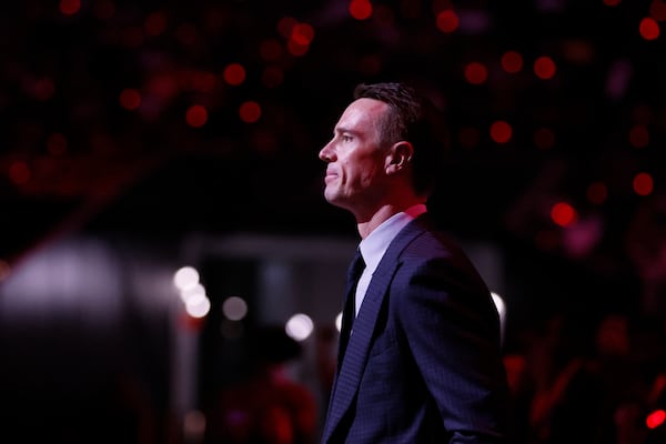 Former Falcons quarterback Matt Ryan waits to be recognized during the team’s Ring of Honor induction ceremony on Thursday, Oct. 3, 2024, at Mercedes-Benz Stadium in Atlanta. Ryan currently wears several different hats for the franchise. (Miguel Martinez/AJC 2024)