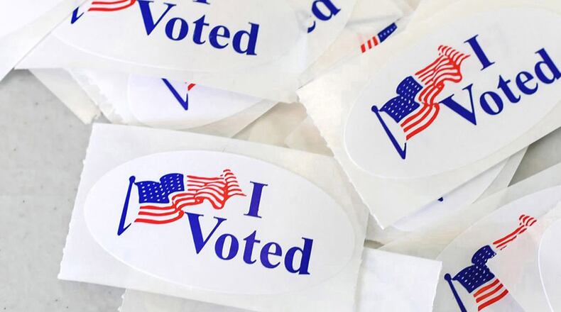 Clayton County Commission District 1 race ends in a runoff after Tuesday's special election while Joy Cooper Teller appears to have won the District 8 seat on the Clayton County Board of Education. (Robyn Beck/AFP/Getty Images/TNS)