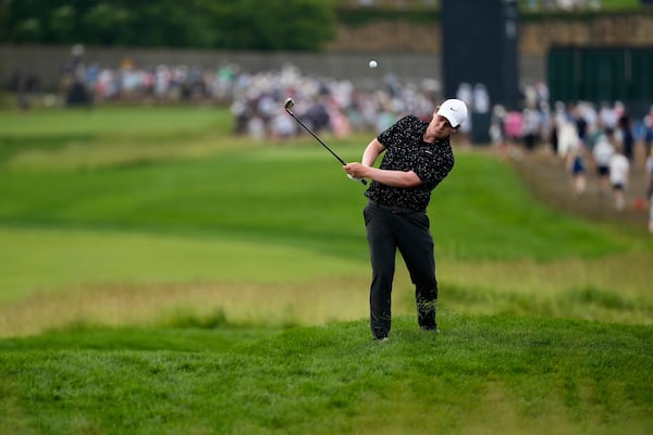 Robert MacIntyre, of Scotland, hits from the rough on the second hole during the final round of the U.S. Open golf tournament at Oakmont Country Club Sunday, June 15, 2025, in Oakmont, Pa. (AP Photo/Carolyn Kaster)