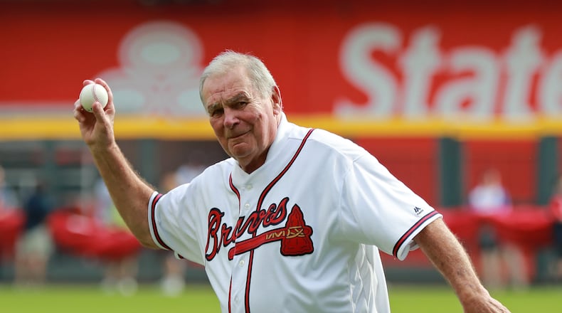 Hall of Famer Bobby Cox throws out the first pitch before Monday's game at SunTrust Park. (Curtis Compton/ccompton@ajc.com)