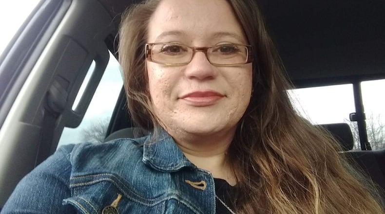 Amanda Sharpe, 40, was found wrapped in sheets and blankets at a construction site in Acworth on Oct. 14. She had died two days earlier, investigators believe.