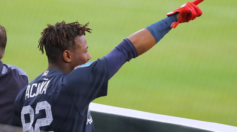 March 27, 2018 Atlanta: Braves outfielder Ronald Acuna Jr., points at the opposing dugout during the first inning in the Future Stars Exhibition Game on Tuesday, March 27, 2018, at SunTrust Park in Atlanta. Curtis Compton/ccompton@ajc.com