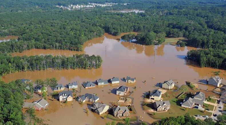 Austell will contribute 5 percent or $120,000 - whichever is lower - toward the $1.2 million cost by the county for a $2.4 million federal study to help control future flooding from the Sweetwater Creek Basin. AJC file photo
