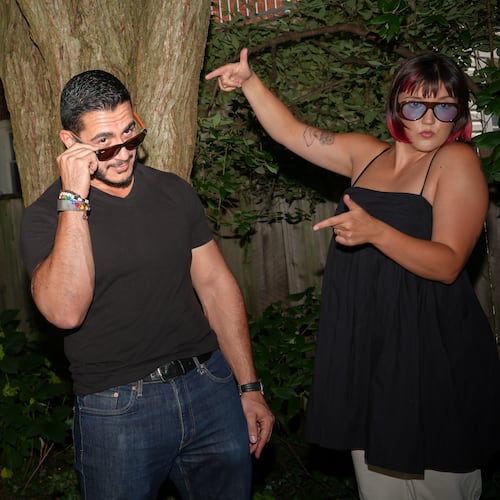 Abdul El-Sayed, a progressive candidate in the Democratic primary for U.S. Senate in Michigan, films a social media video at a pool party for content creators supporting his campaign, Monday, Aug. 3, 2026, in Detroit. (AP Photo/Julia Demaree Nikhinson)