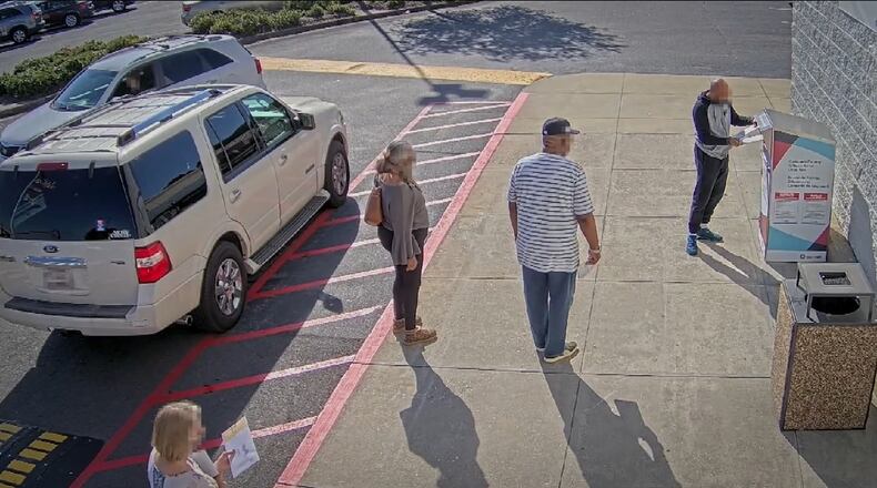 Mark Andrews (right), an auditor from Gwinnett County, filed a lawsuit in October 2022 against the makers of "2000 Mules," a movie that falsely claimed he had committed election fraud. (Image from "2000 Mules")