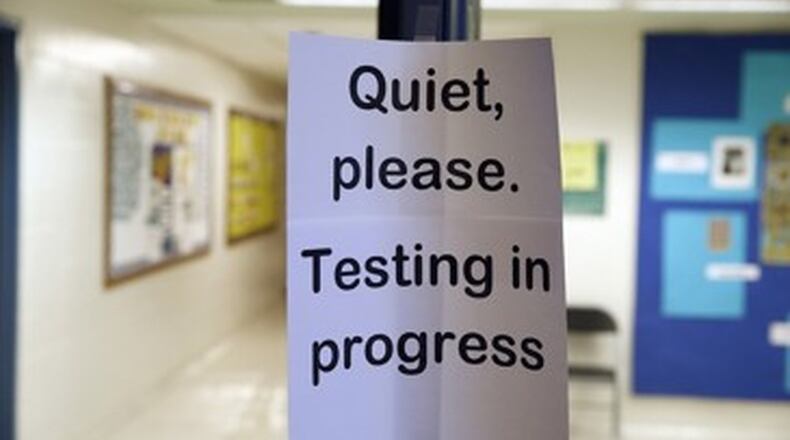 School districts hastened to point out where their scores had gone up Friday when Georgia released results of its annual school rating system, but those scores also underlined some big questions about how learning is measured. AJC file photo