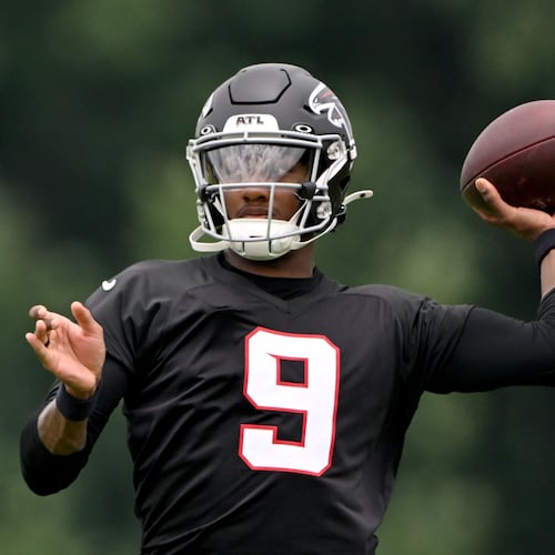 Falcons quarterback Michael Penix Jr. runs a drill during an OTA workout at the team's traning facility on Wednesday, May 27, 2026, in Flowery Branch. (Hyosub Shin/AJC)